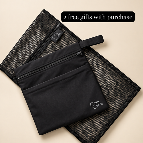 A black mesh zip pouch with a smaller black fabric zip pocket placed on top, both branded with the Calm Curve logo, on a light beige background. A black text banner at the top reads '2 free gifts with purchase'.
