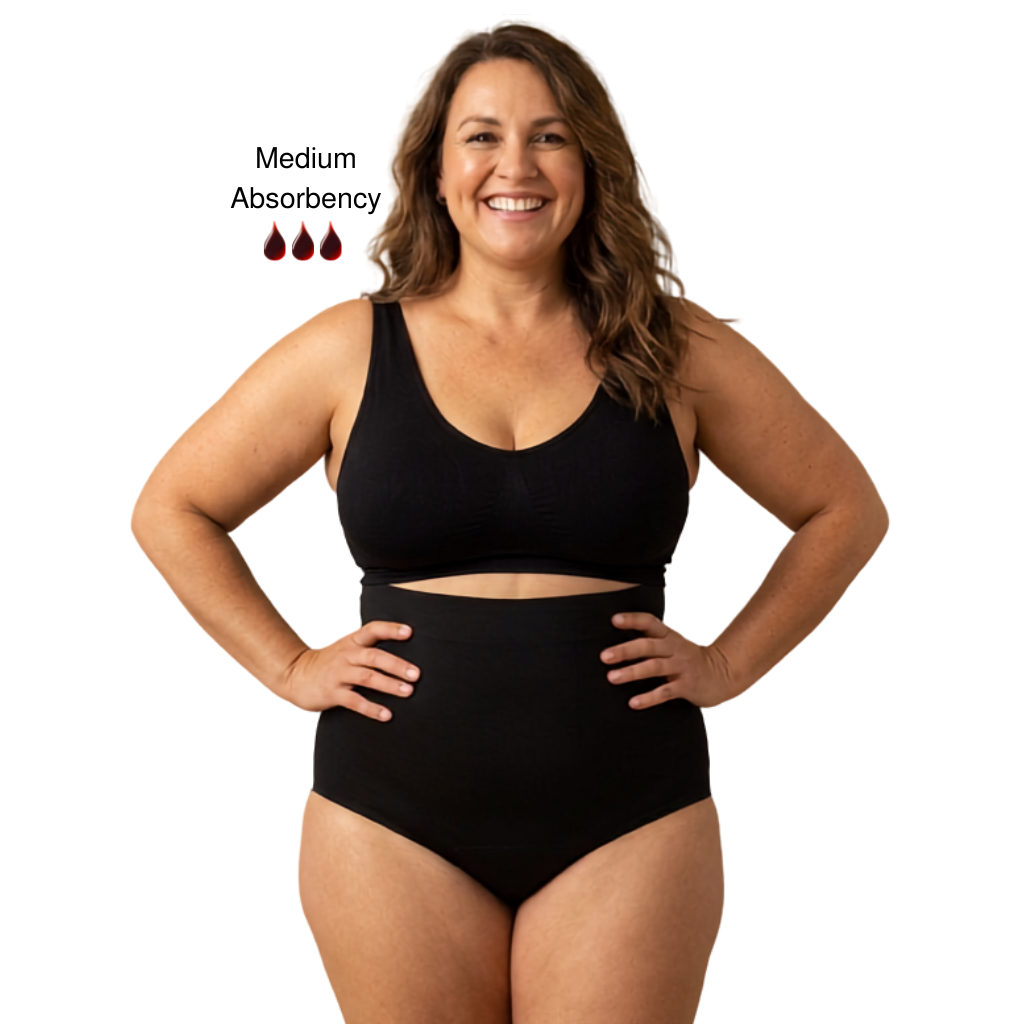 Woman wearing a black period absorbency shapewear product with medium absorbency rating on a white background